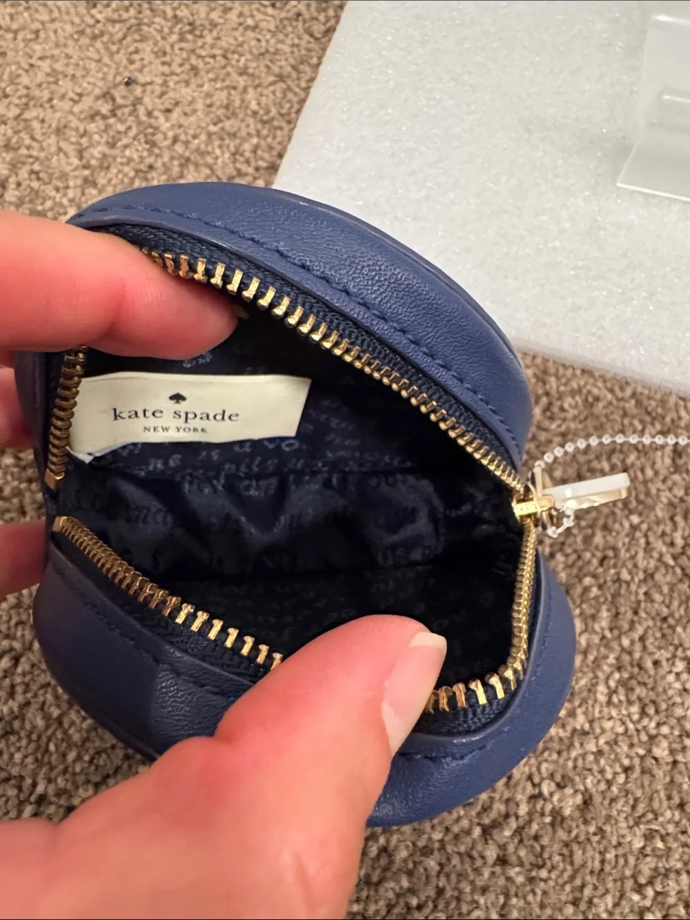 Kate spade everything starts from a dot storybook lining coin purse